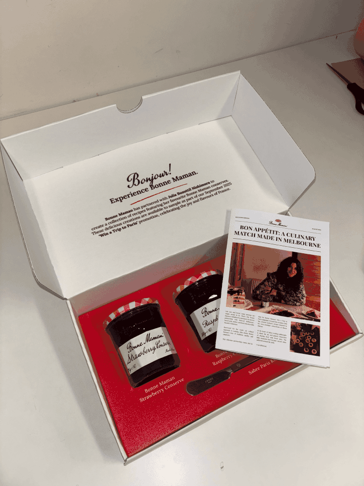 custom ecommerce packaging with 3 jams and a newspaper