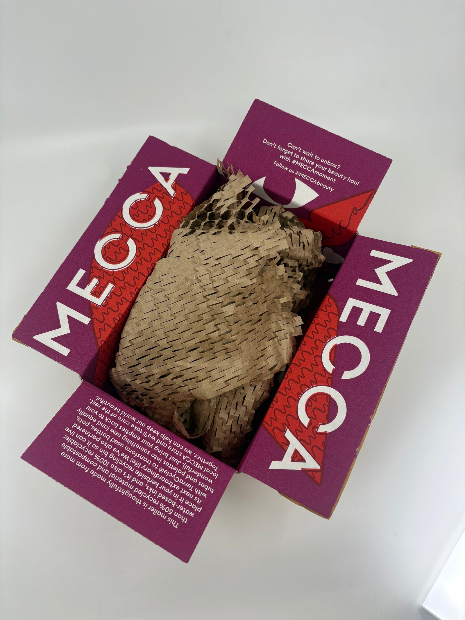 Mecca secondary packaging box opened 