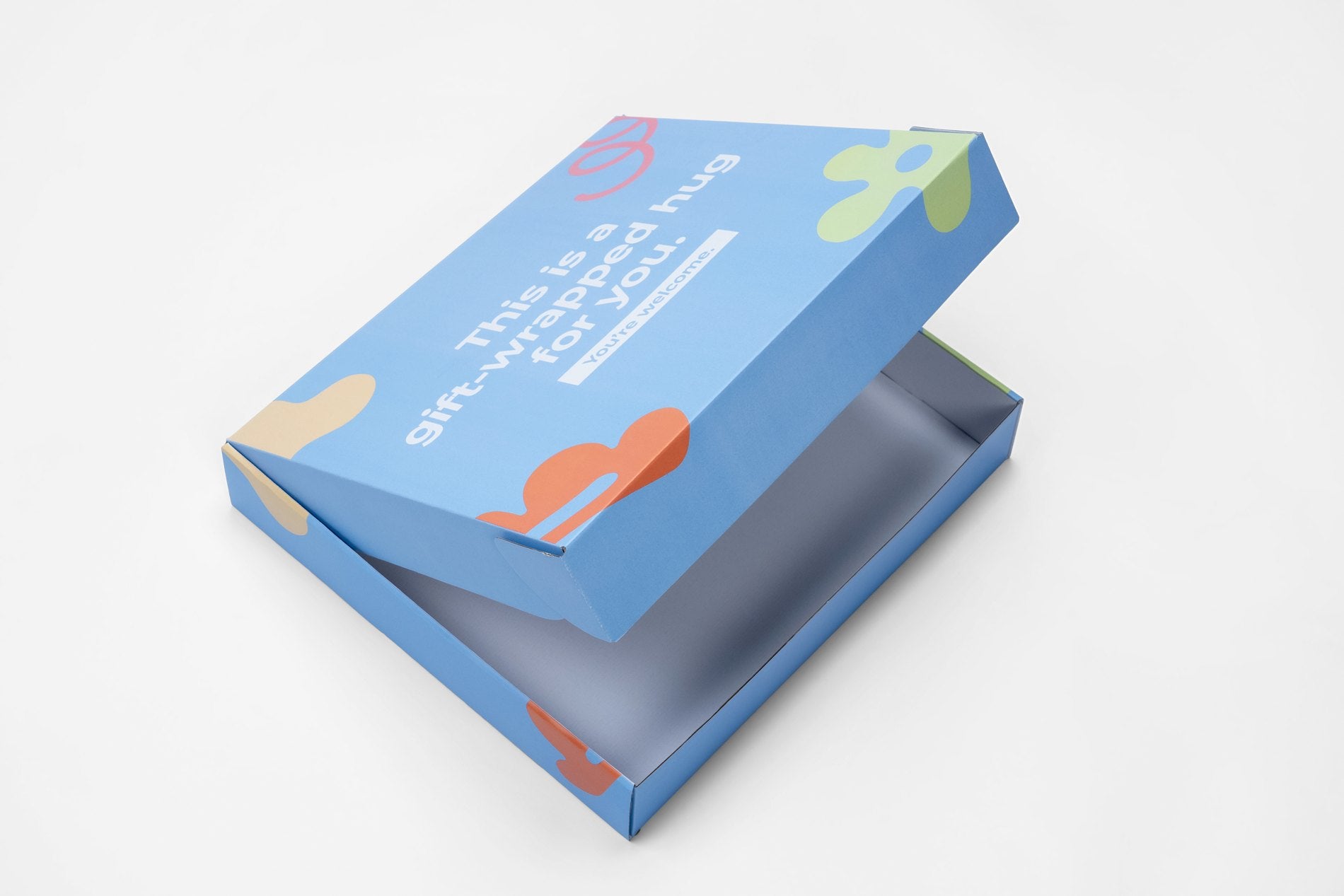 Custom-printed mailer box made by Boxes To Go, opened to show branded interior print
